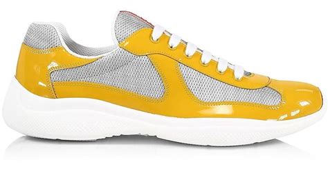 prada gold sneakers